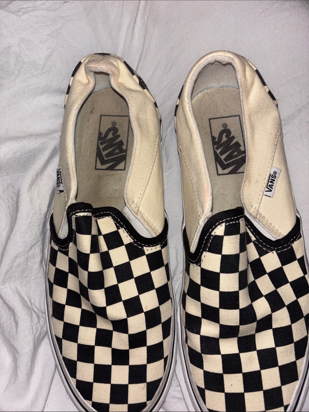 Vans woman’s Checkerboard Slip-On Shoes - Black and White